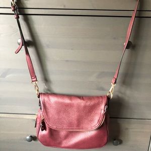 Maroon cross body bag: outside zipper, flap zipper, inner zipper, inner pocket